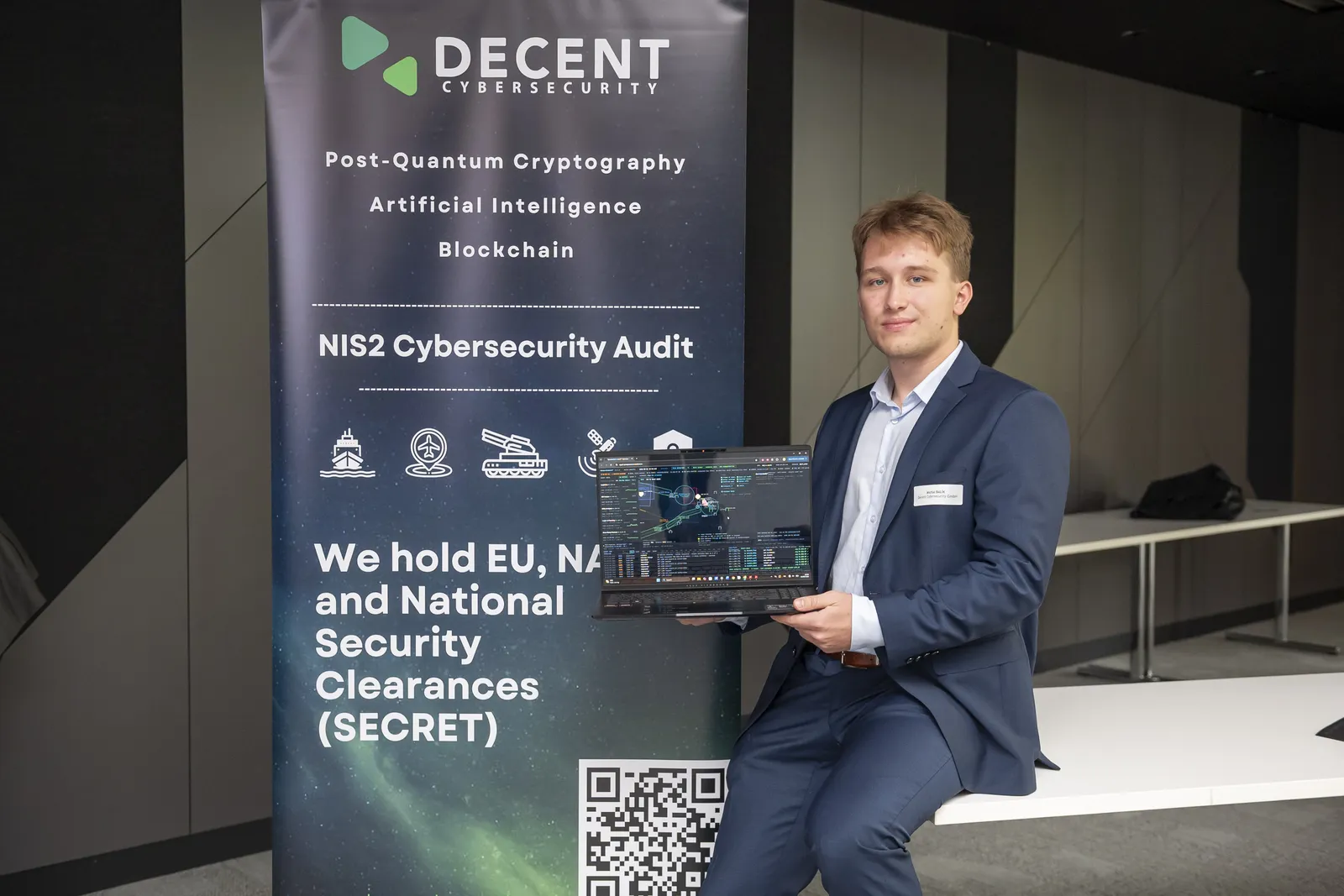 Michal Balík of Decent Cybersecurity displaying SynapseCommand on a laptop at the Graz Industry Supplier Day.