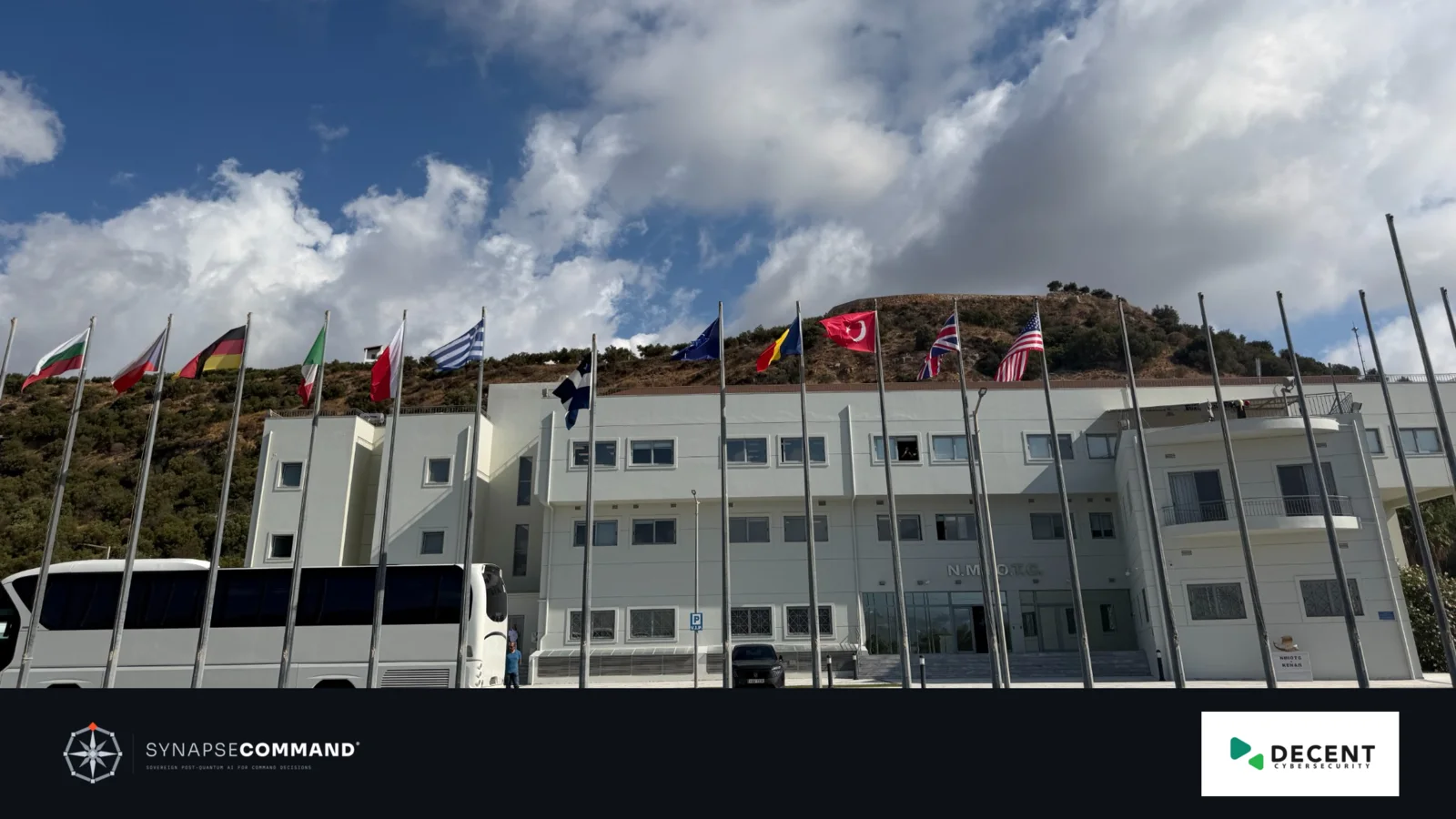 Second view of the NATO Maritime Interdiction Operational Training Centre and national flags in Souda Bay.
