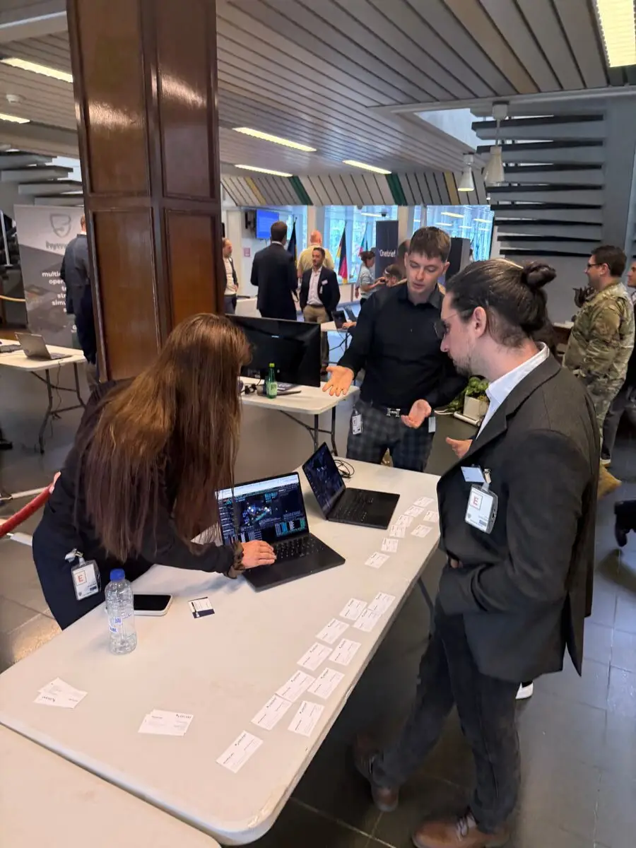 Participants reviewing SynapseCommand during a live demonstration at SHAPE